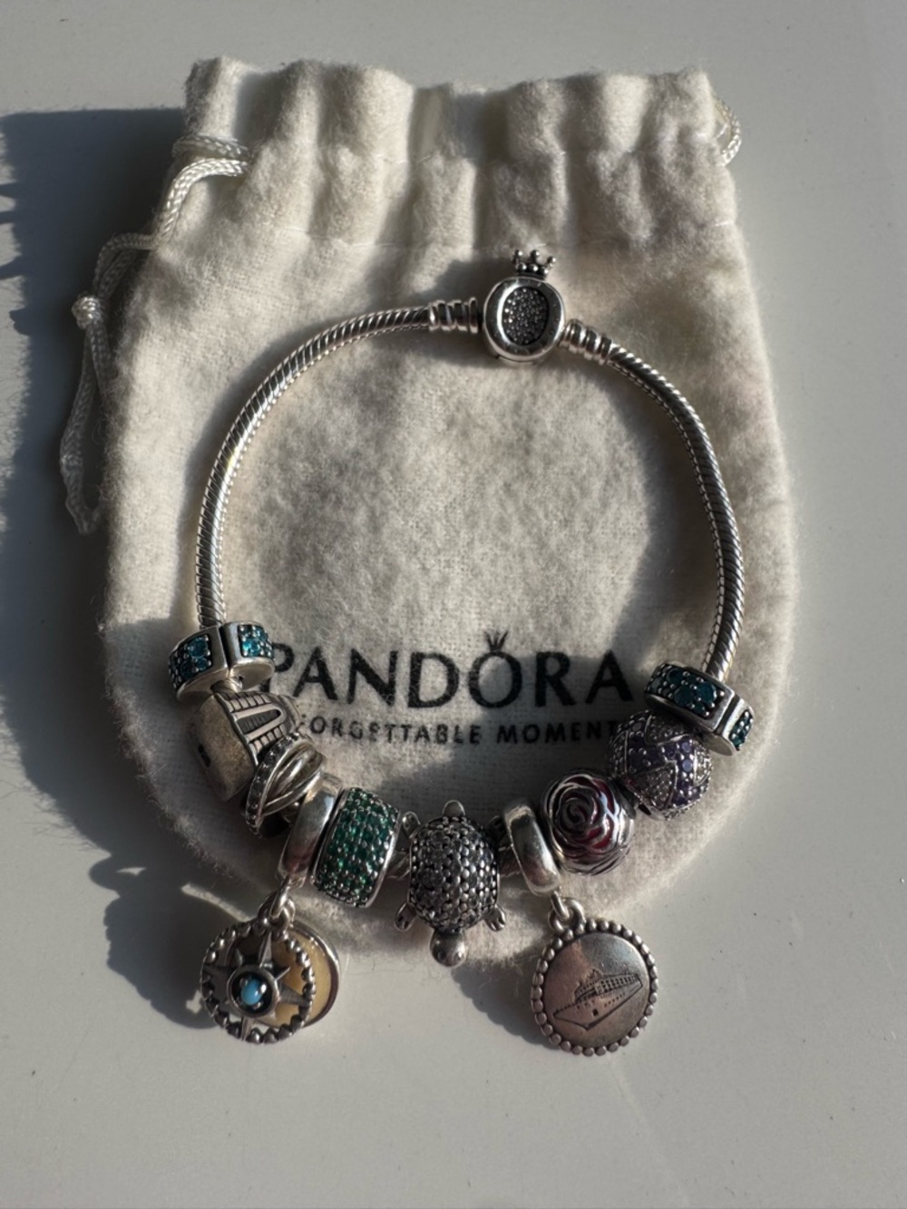 Pandora Silver Charm Bracelet with Teal and Purple Accents